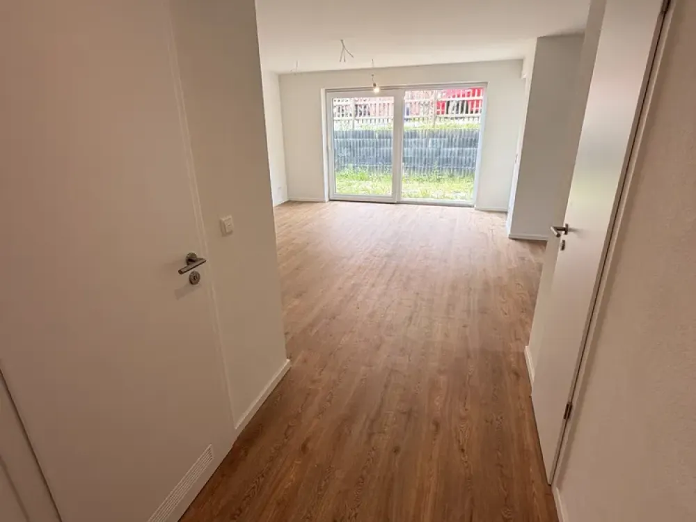 *NEUBAU - ERSTBEZUG* Erdgeschosswohnung, 2 Zimmer, 2 Terrassen und großer Garten