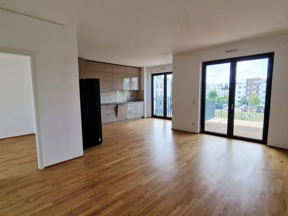ERSTBEZUG - Attraktive Neubauwohnung mit EBK und TG-Stellplatz!
