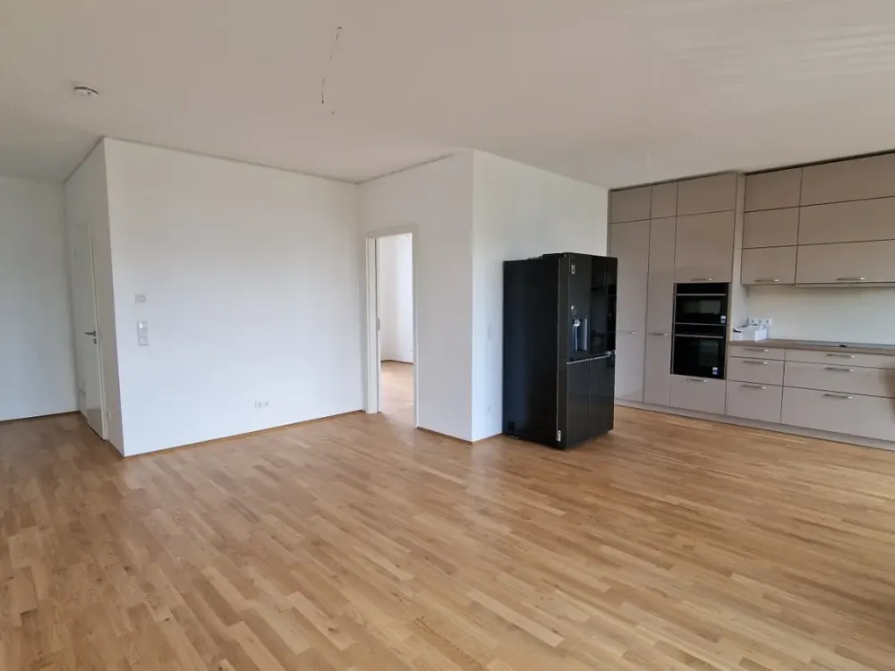 ERSTBEZUG - Attraktive Neubauwohnung mit EBK und TG-Stellplatz!