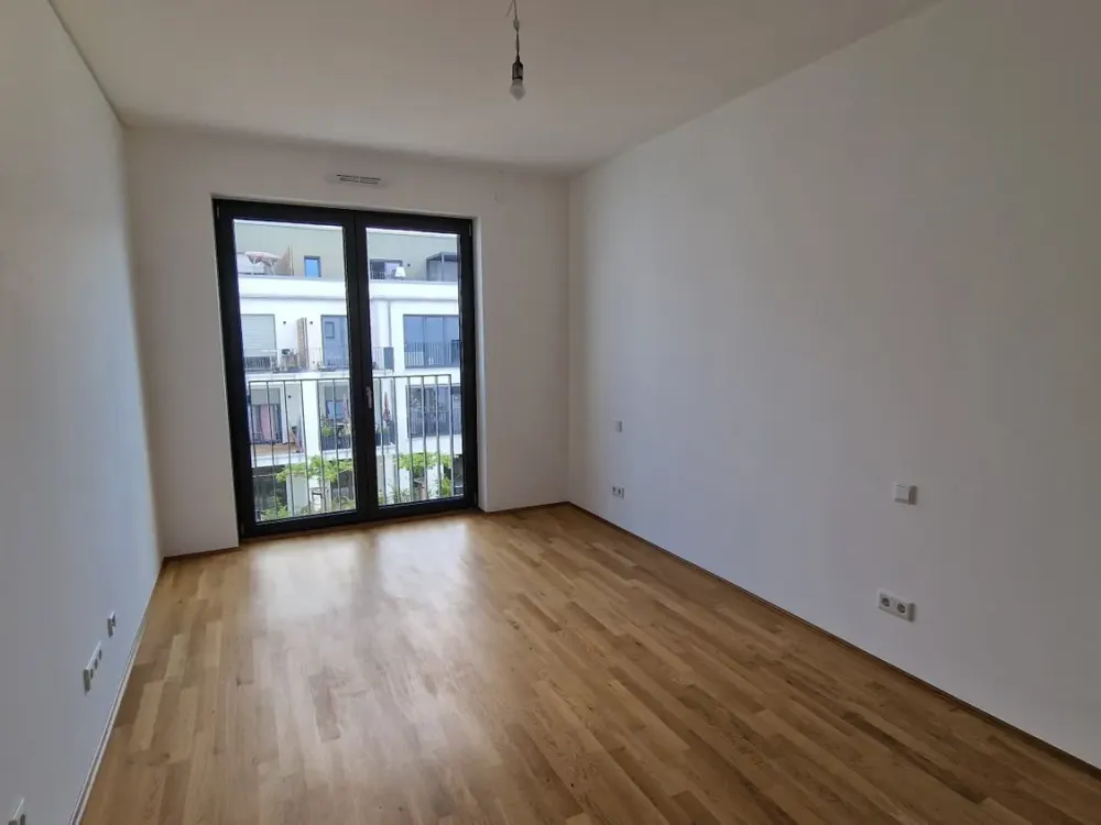 ERSTBEZUG - Attraktive Neubauwohnung mit EBK und TG-Stellplatz!