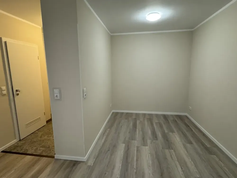 Modernes Single-Apartement mit TG- Stellplatz und Blick ins Grüne!