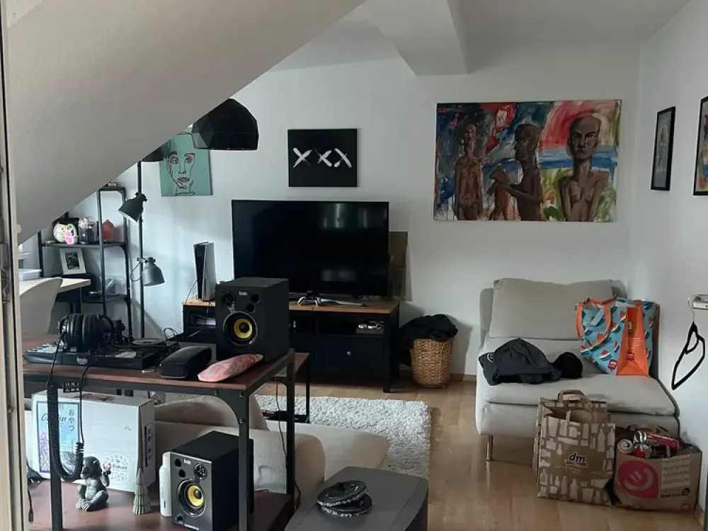 2-Zimmer-Dachgeschosswohnung mit Balkon & EBK & Garten