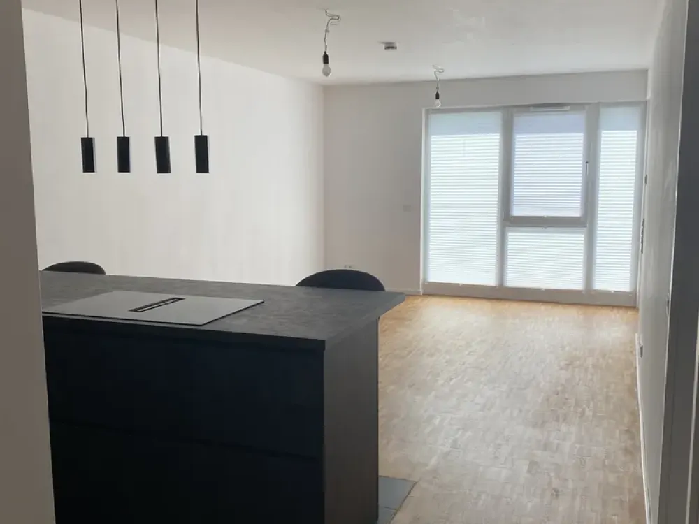 New Build 2023: Bright 2-Room Apartment with Balcony, Fitted Kitchen and Underground Parking Space