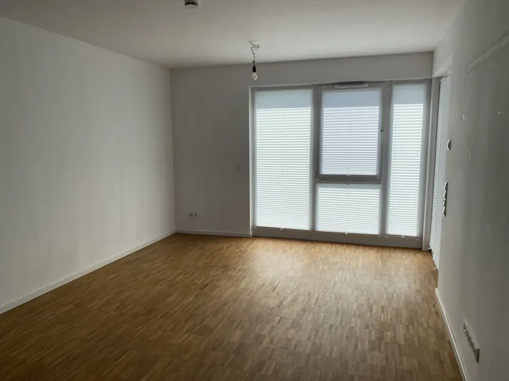 New Build 2023: Bright 2-Room Apartment with Balcony, Fitted Kitchen and Underground Parking Space