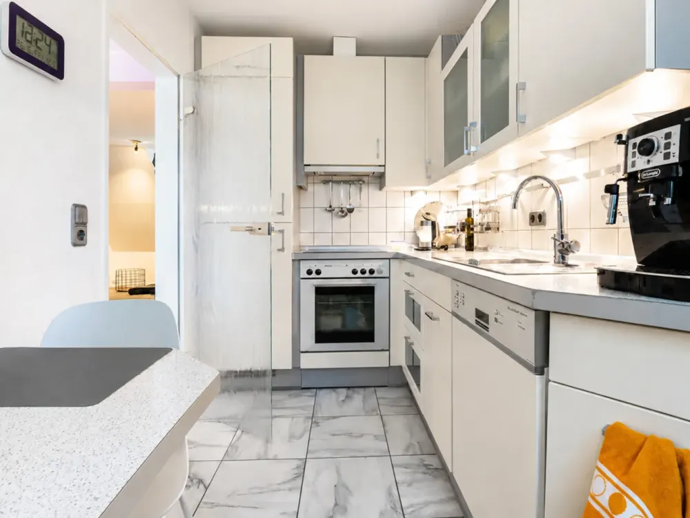 Gemütliche 3-Zimmer-Dachgeschosswohnung mit Balkon und Tiefgaragenstellplatz
