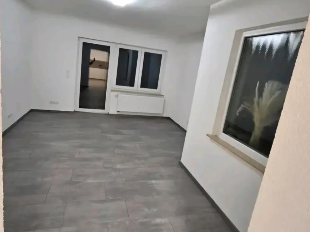 Helle 3,5 Zimmer Wohnung mit Terasse und Garten