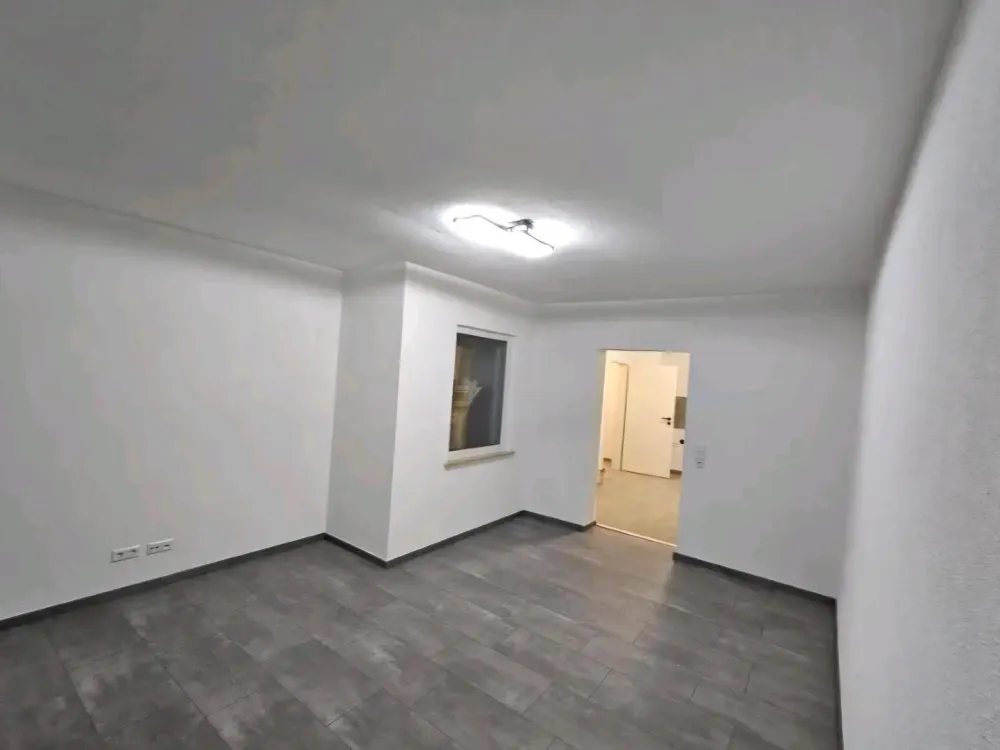 Helle 3,5 Zimmer Wohnung mit Terasse und Garten