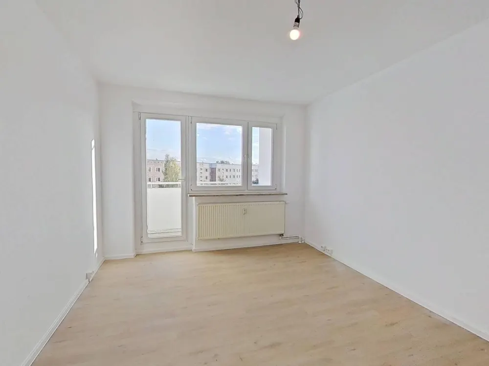 Modern 3-Room Apartment with Balcony Overlooking the Roofs of Rostock