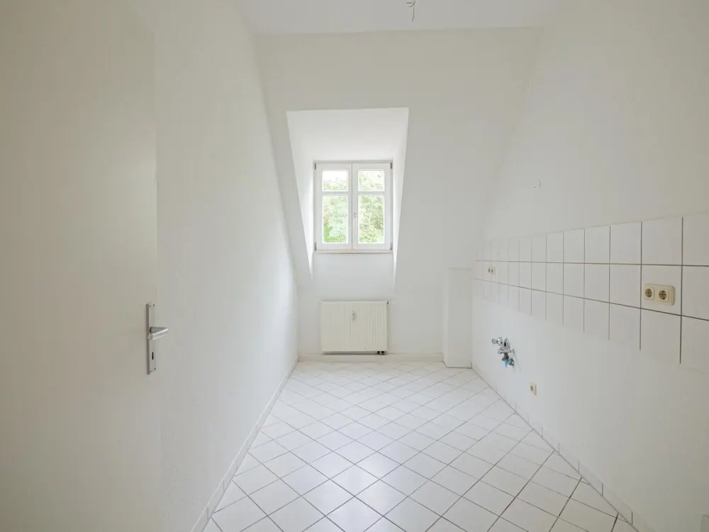 Frisch renovierte 3-Zimmer-Dachwohnung in zentraler aber ruhiger Lage.
