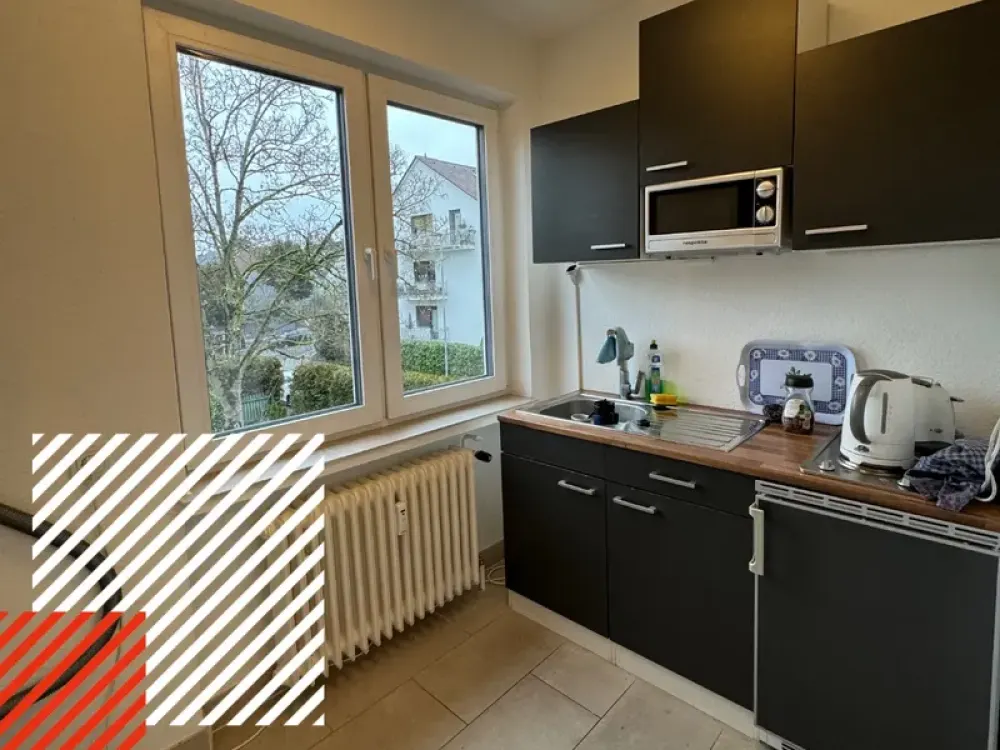1 Zimmer mit Balkon und eigenem Bad!