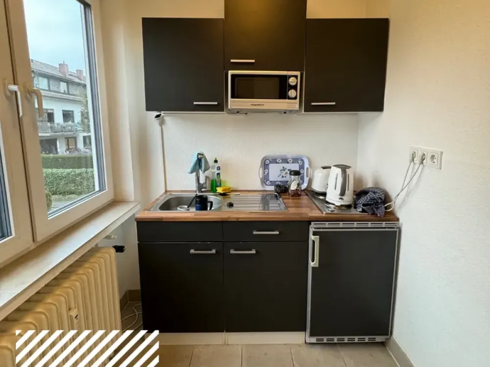 1 Zimmer mit Balkon und eigenem Bad!