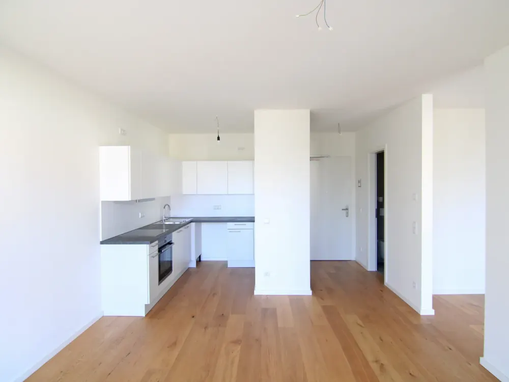 Elegante Designwohnung mit großem Balkon, Einbauküche und tollem Ambiente!