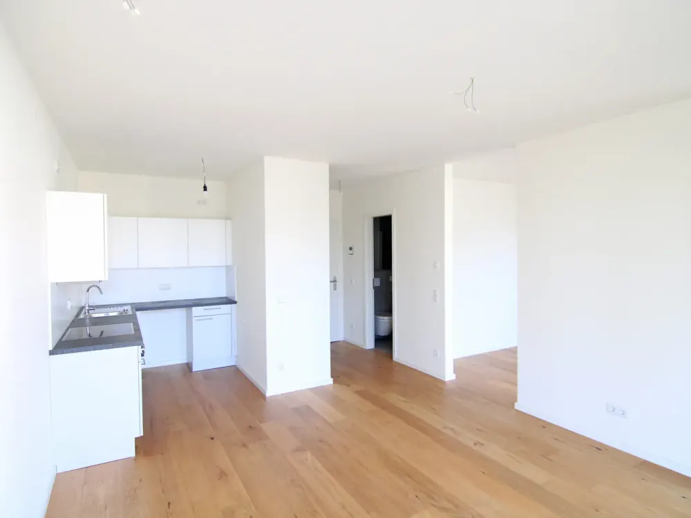 Elegante Designwohnung mit großem Balkon, Einbauküche und tollem Ambiente!