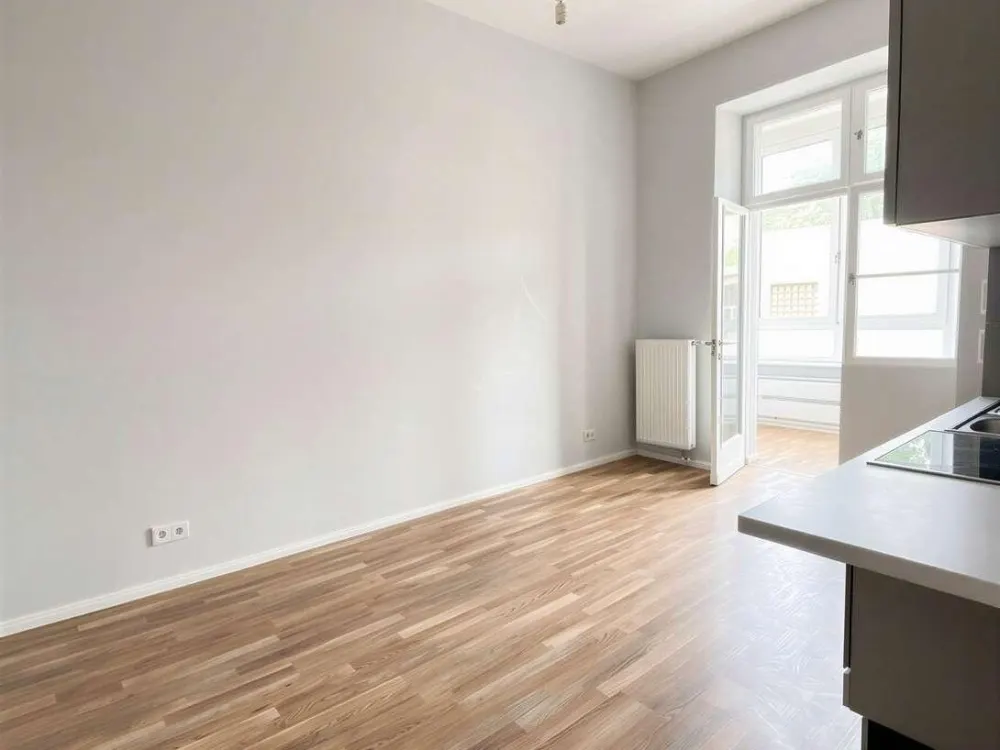 Wohnqualität mit besonderem Extra: Stilvolle 2-Zimmer-Wohnung mit Wintergarten