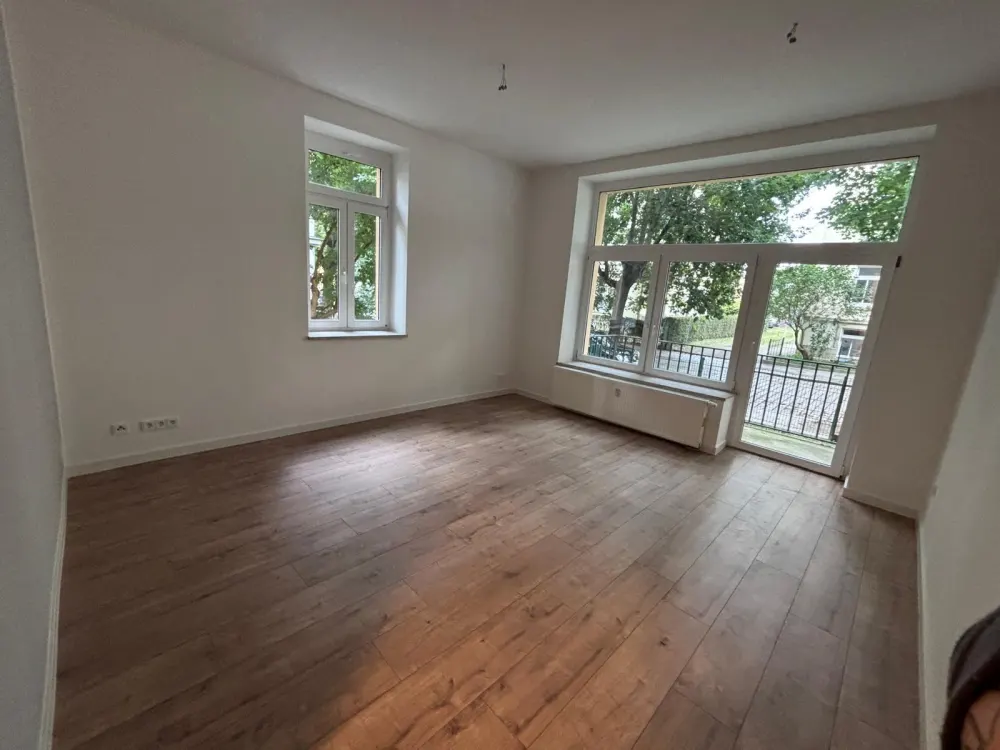 Stilvoll modernisierte 2-Zimmer-Wohnung mit Terrasse & Garten