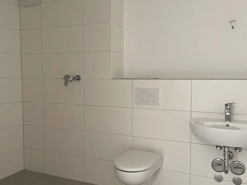 Gartenidylle im Zentrum: barrierefreie 2-Zimmer-Wohnung mit Garten