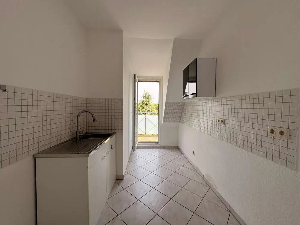 Living Above the Roofs: 3-Room Attic Apartment with Balcony!