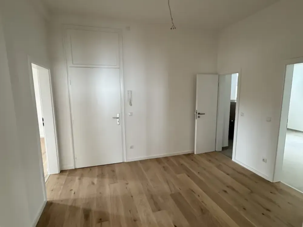 Erstbezug nach Kernsanierung, Stilvolle 3-Zimmer-Wohnung mit Balkon und hochwertiger Ausstattung