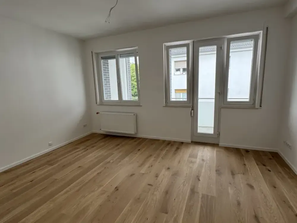 Erstbezug nach Kernsanierung, Stilvolle 3-Zimmer-Wohnung mit Balkon und hochwertiger Ausstattung