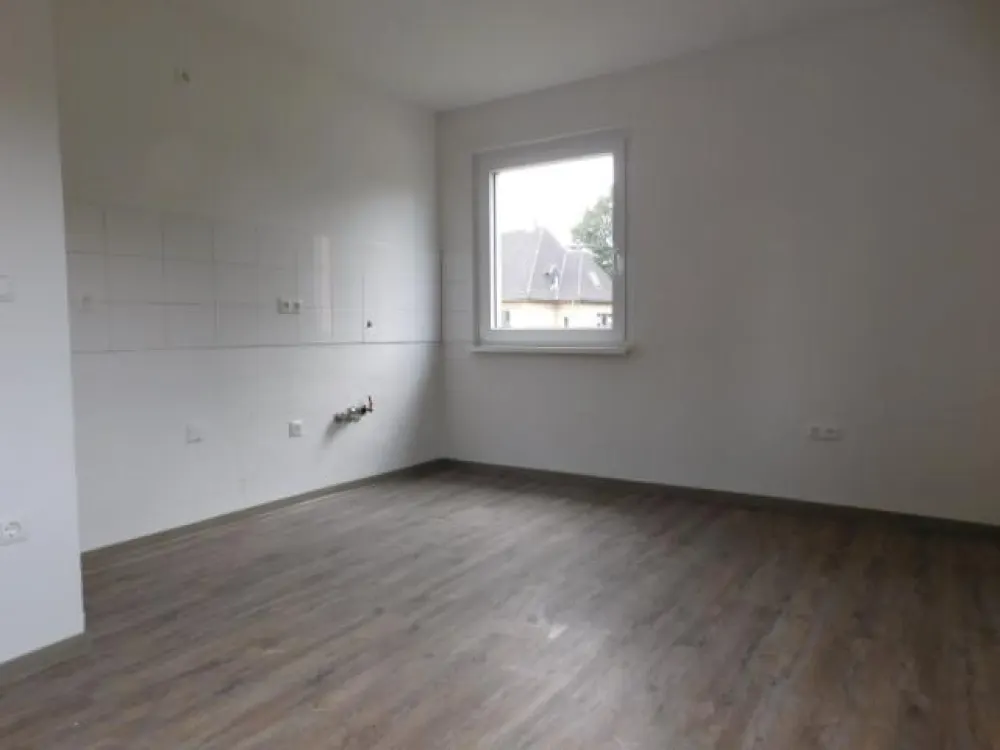 Bezugsfertige 2-Zimmerwohnung im 1. OG in ruhiger Lage mit Vinylboden...