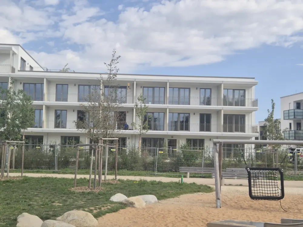 2-Zimmer-Neubauwohnung (47,77 m²) mit Südbalkon & Parkblick, Erstbezug in Feldmoching