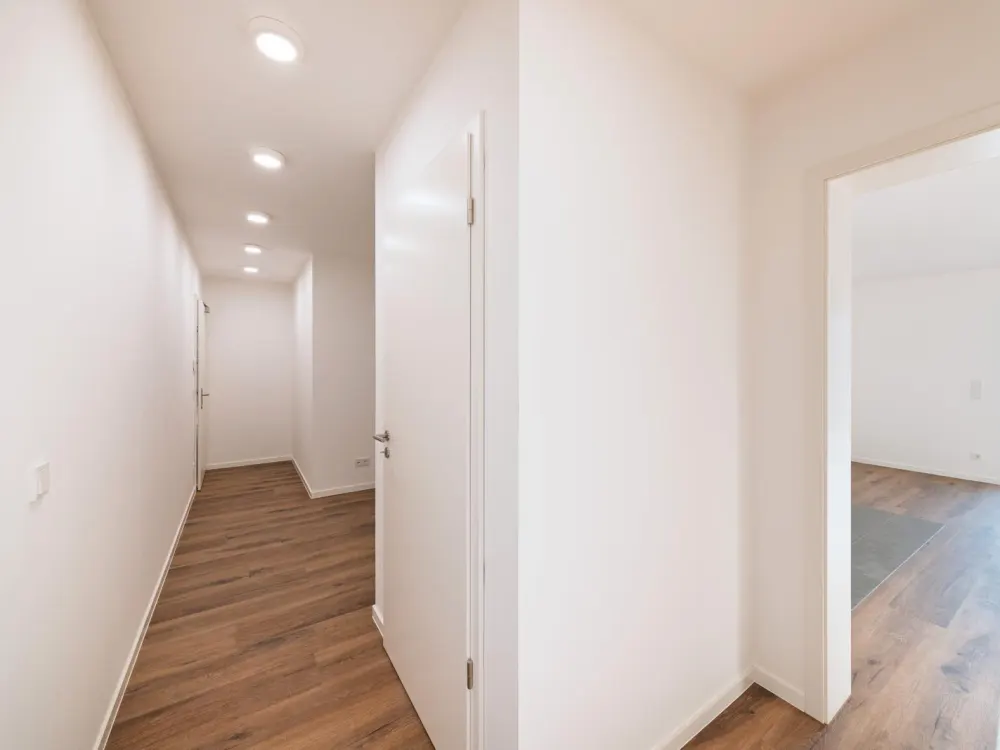 2 Raumwohnung mit Einbauküche, Sonnenbalkon und Tiefgaragenstellplatz - WE14