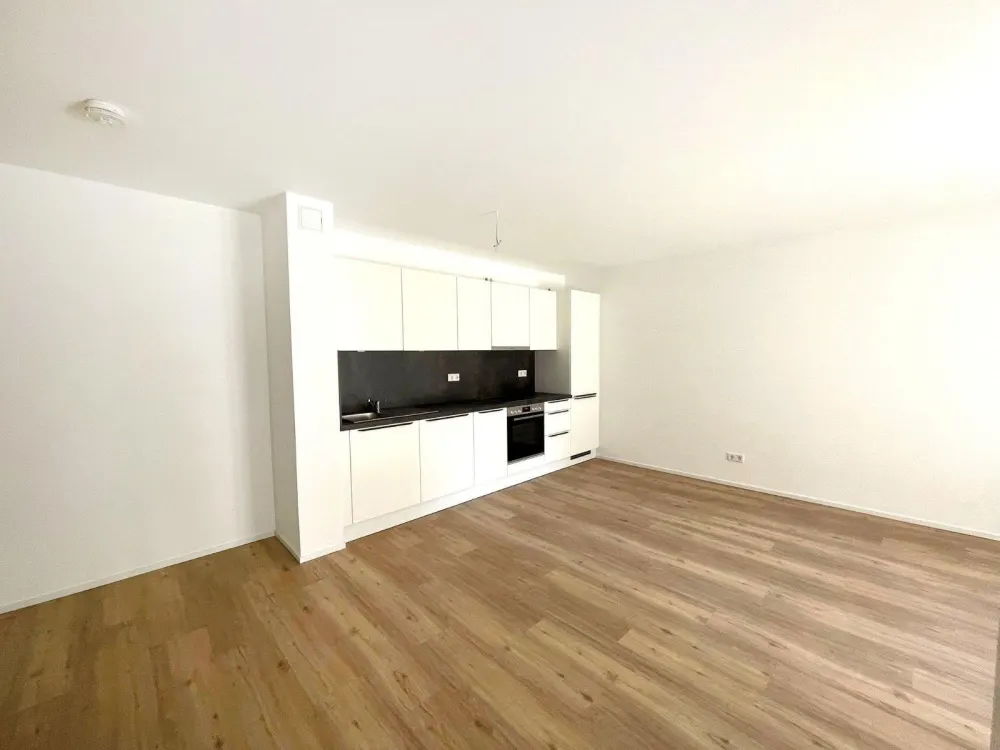 Lichtdurchflutete Terrassenwohnung mit eigenem Gartenanteil! *Neubau*