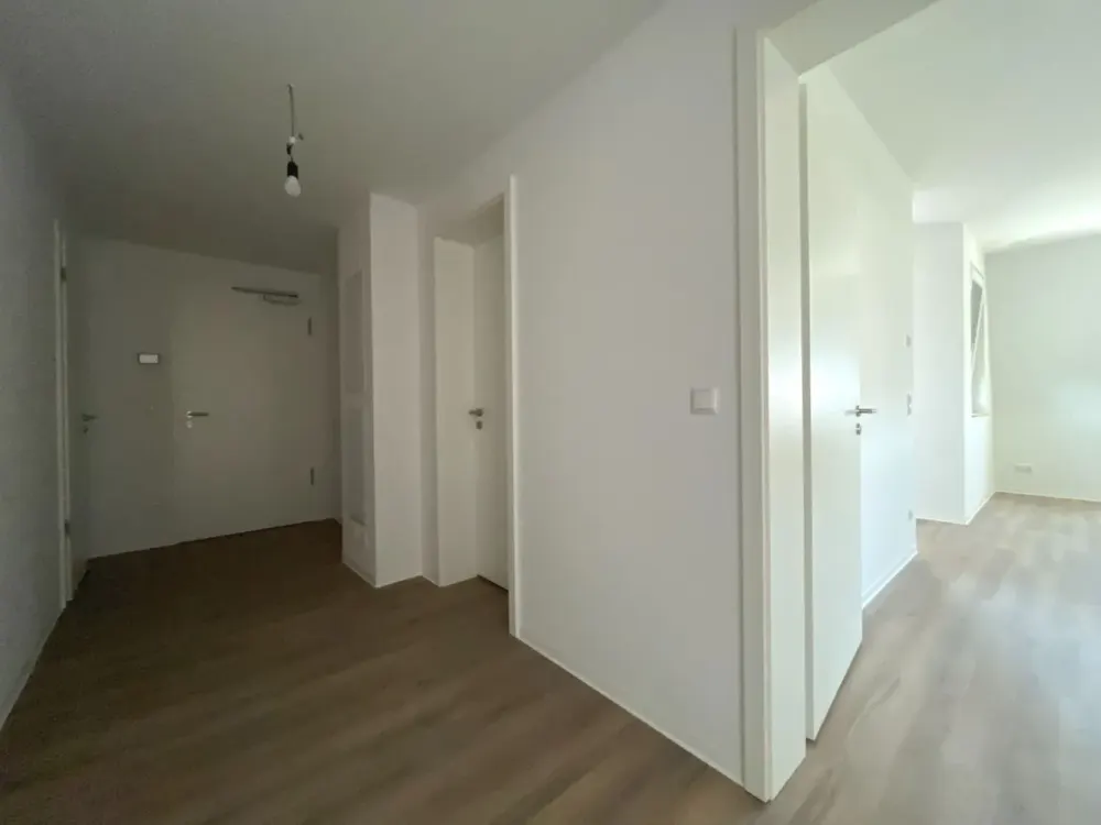 Stilvolle 3-Zimmer-Neubauwohnung mit Badewanne, Dusche und Loggia im Zentrum-Ost | Optional EBK