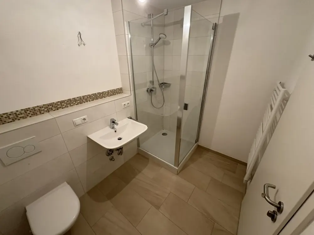 Comfortable 1-Room Apartment with Terrace and Underground Parking Space in Central Location of Germering