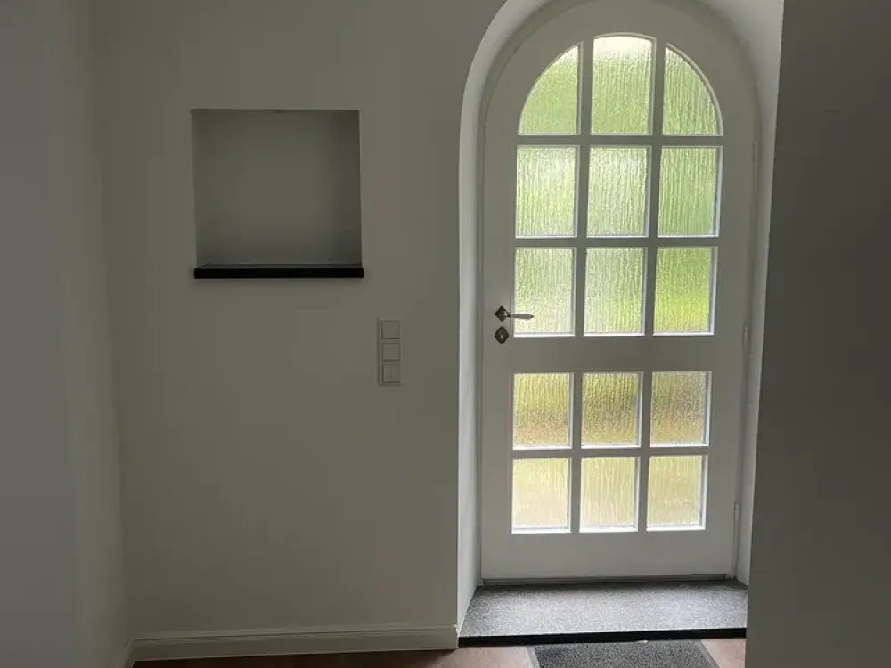Edle Souterrain-Wohnung mit eigener Terrasse
