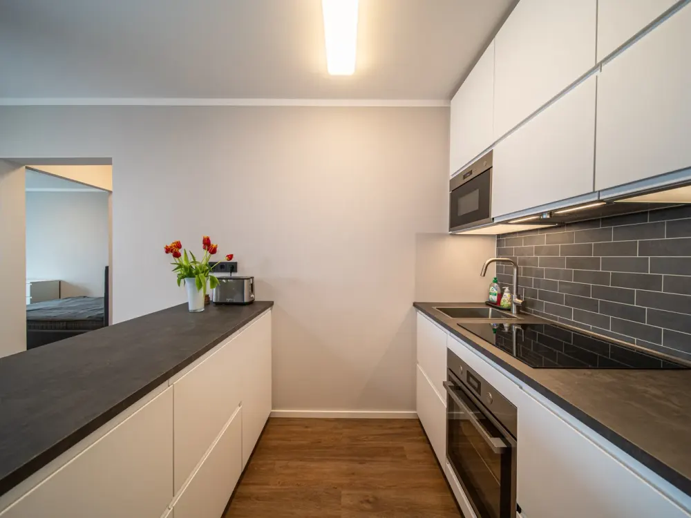 Luxuriös sanierte Wohnung über der Shopping-Mall und den Dächern der Stadt