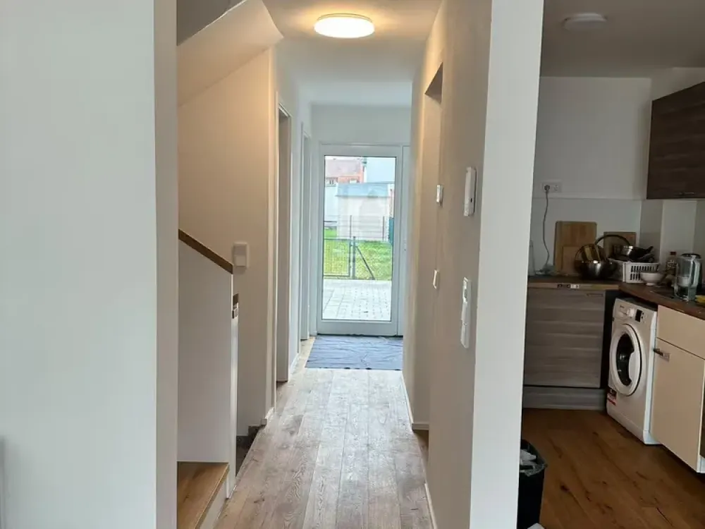 Spacious 5-Room Mid-Terrace House with Garden and Underground Parking