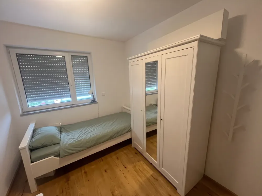 Spacious 5-Room Mid-Terrace House with Garden and Underground Parking