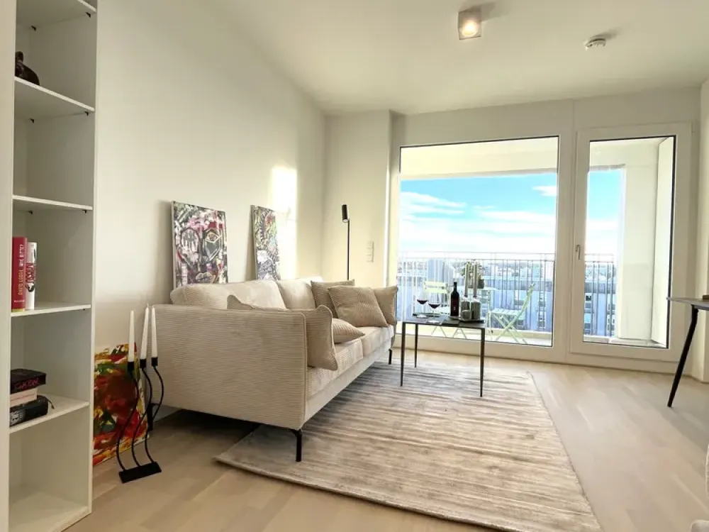 Alpenblick included! 1-room attic apartment fully furnished with south-facing loggia in Munich