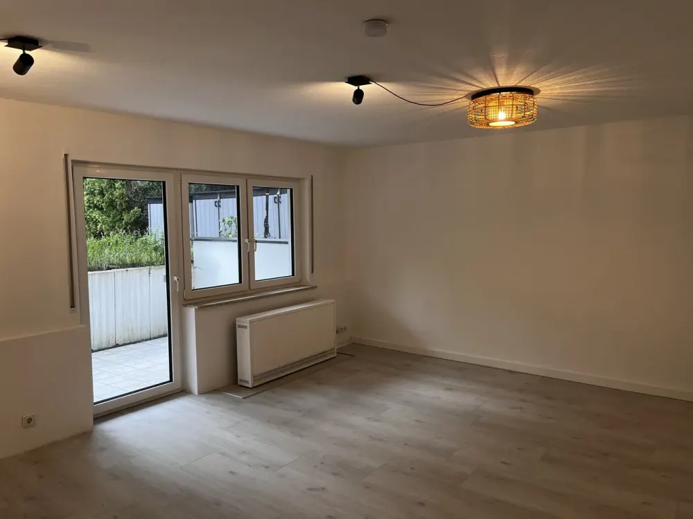 1-Zimmer-Wohnung mit Terrasse, Einbauküche und Gartenmitnutzung