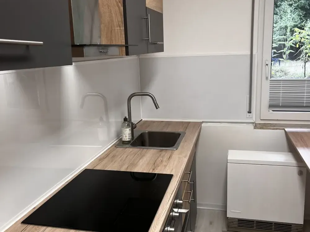 1-Zimmer-Wohnung mit Terrasse, Einbauküche und Gartenmitnutzung