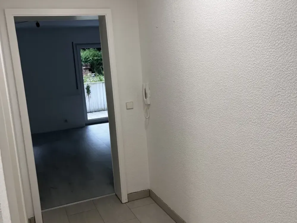 1-Zimmer-Wohnung mit Terrasse, Einbauküche und Gartenmitnutzung