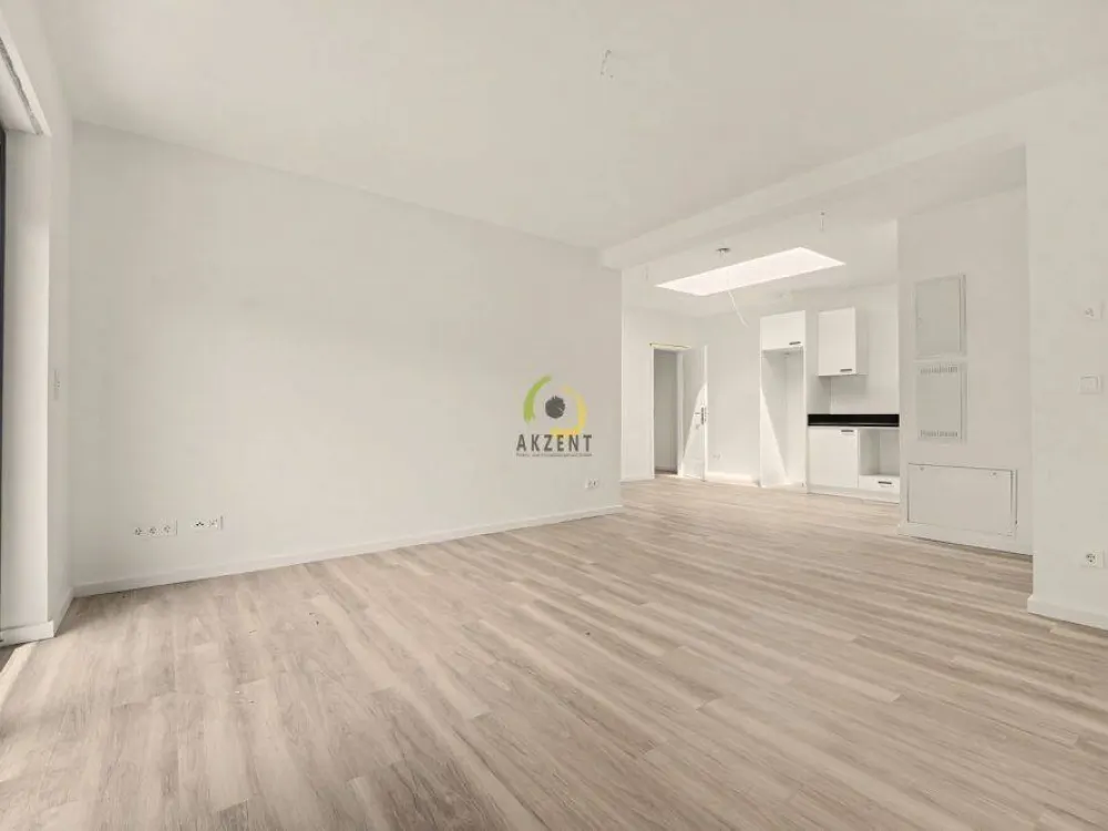Erstbezug - Stilvolle 2-Zimmer-Neubauwohnung mit Balkon, EBK & Möblierung - Direkt am S-Bahnhof