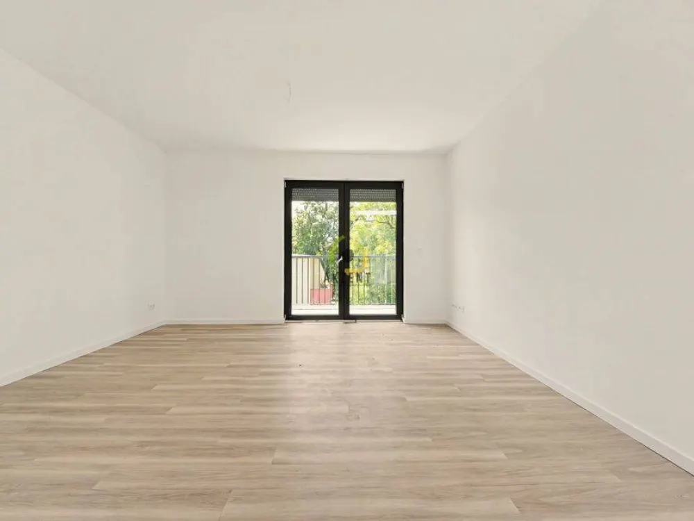 Erstbezug - Stilvolle 2-Zimmer-Neubauwohnung mit Balkon, EBK & Möblierung - Direkt am S-Bahnhof