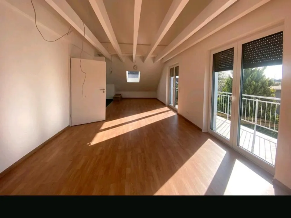 Moderne 4-Zimmer-Dachgeschosswohnung in Kahl am Main mit hochwertiger Ausstattung und Luft-Wasser-Wärmepumpe