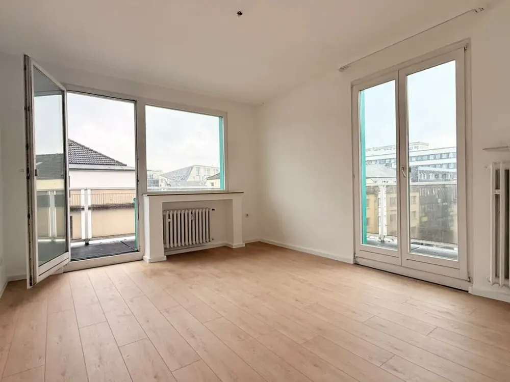 Helle 3-Zimmer-Dachgeschosswohnung mit großzügigem Rundum-Balkon