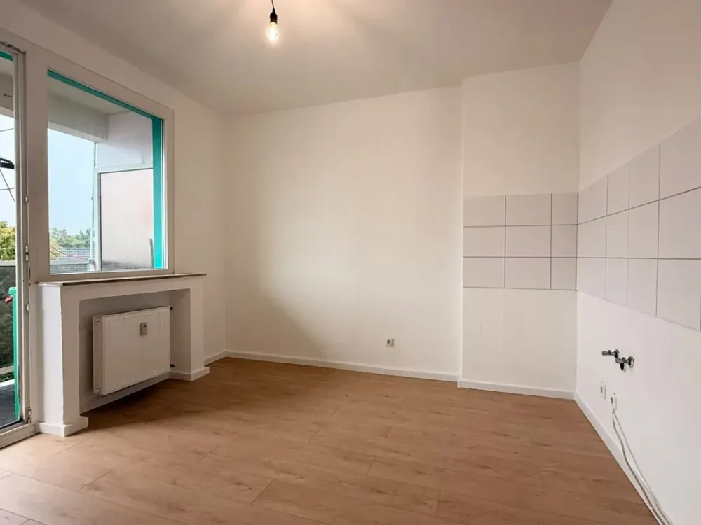 Helle 3-Zimmer-Dachgeschosswohnung mit großzügigem Rundum-Balkon