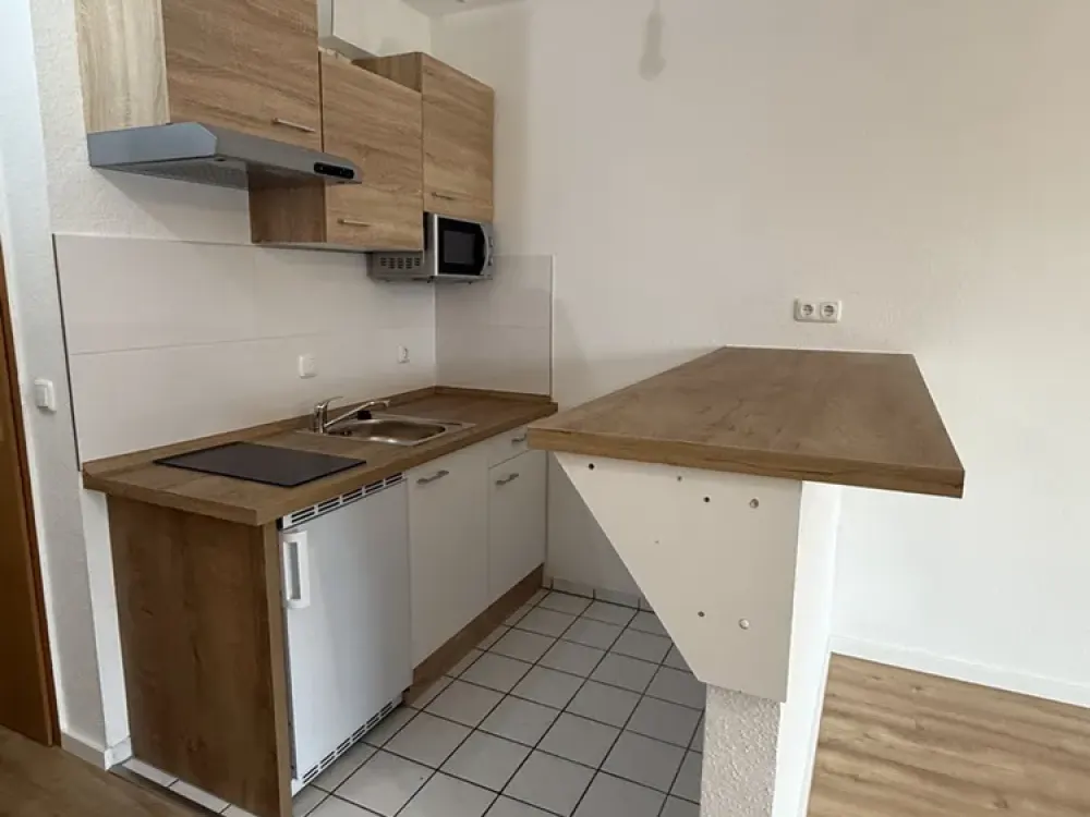 Attractive 2-Room Maisonette Apartment with Kitchenette, Balcony and Parking Space