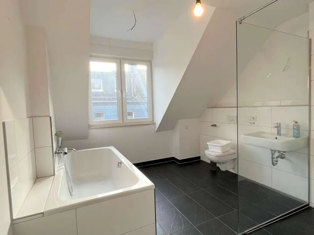 Schicke Dachgeschosswohnung mit Dachterrasse in Dortmund.