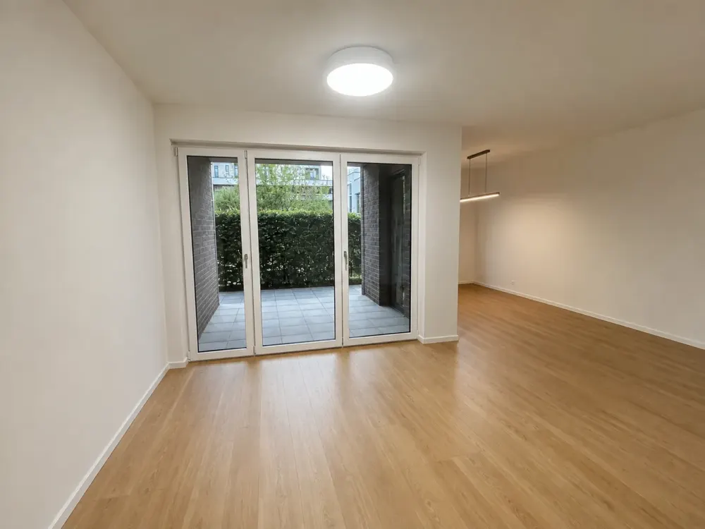 Moderne 3-Zimmer-Erdgeschosswohnung mit 39 m² Privatgarten & TG-Stellplatz in Grafental