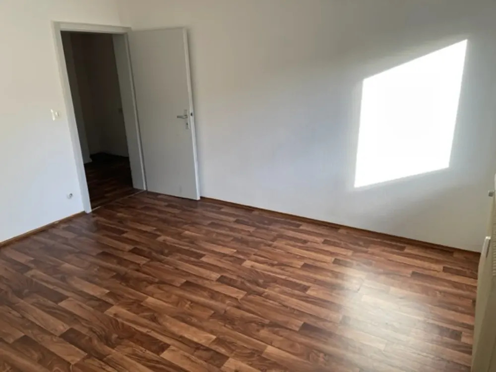 2-Zimmer-Wohnung im EG mit Balkon & Garage in ruhiger, grüner Lage