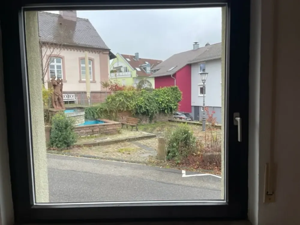 2-Zimmer-Wohnung im EG mit Balkon & Garage in ruhiger, grüner Lage