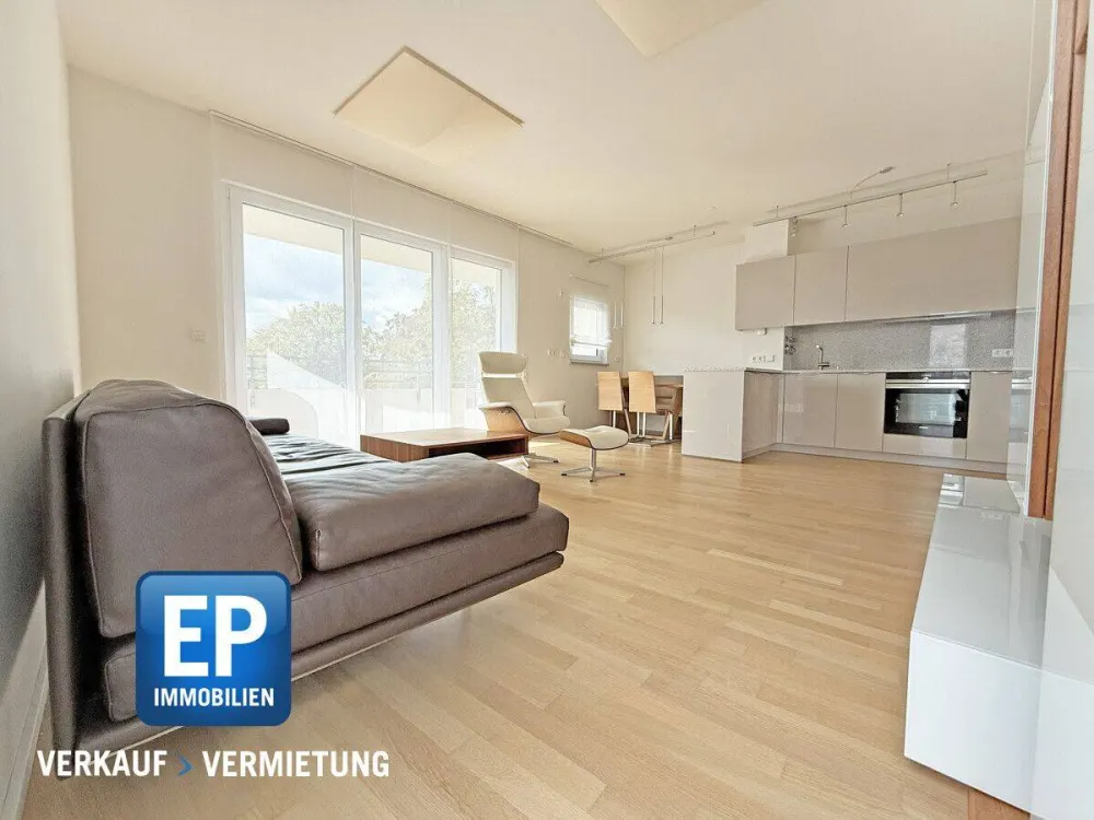 Exclusive 3-Room Attic Apartment with Large South-Facing Balcony, High-Quality Furnishing and Underground Parking