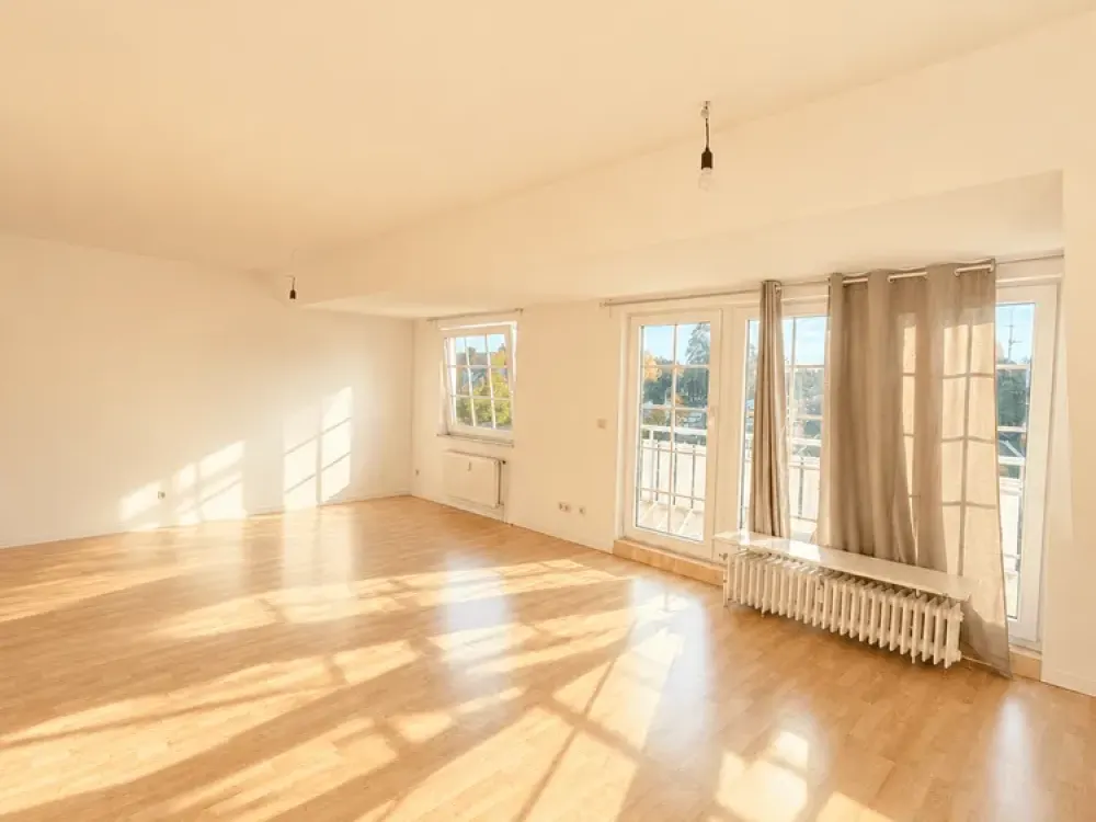 Lichtdurchflutete Maisonettewohnung mit Balkon - Exklusives Wohnen über den Dächern!