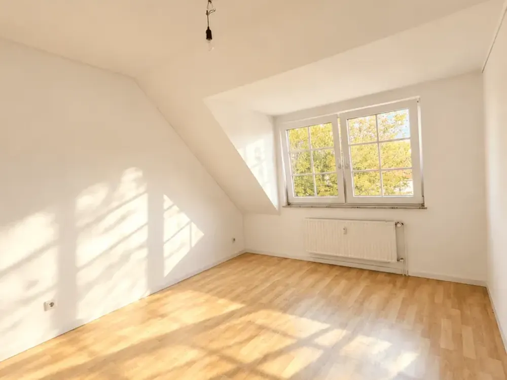 Lichtdurchflutete Maisonettewohnung mit Balkon - Exklusives Wohnen über den Dächern!